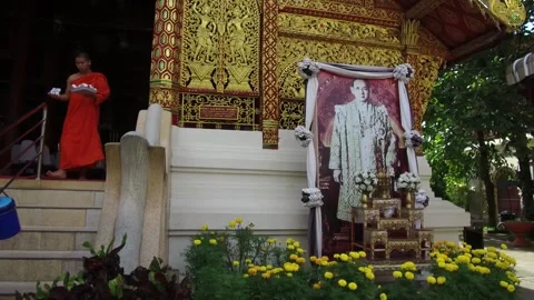 Monks exiting Temple after service in Chiang Mai, Thailand Stock Footage 130707306