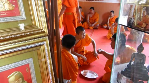 Monks having meals between praying session in temples, Chiangmai, Thailand(CM43a Video stock 38691600