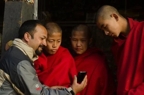 Monks meet Technology Stock Photos