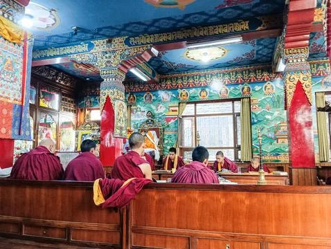 Monks in a monastery classroom. Photos