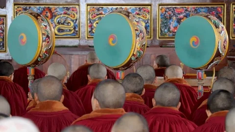 Monks playing the ritual drums inside a monastery in ladakh during a religious 스톡 동영상 121951868