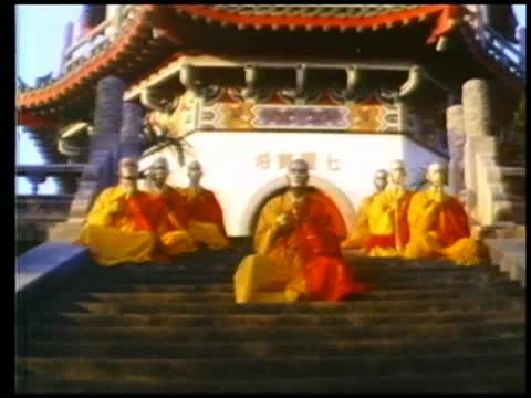 Monks praying on steps in front of shaolin temple 스톡 동영상 11355189