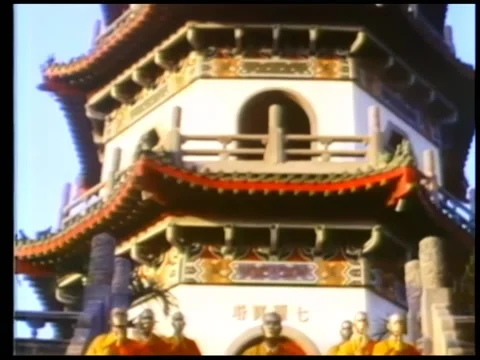 Monks praying on steps in front of shaolin temple Stock Footage 260252809