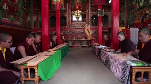 Monks reciting the ancient buddhist script during a ritual in the himalayas. Stock Footage 31839986