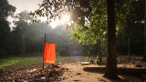 Monks robe hanging to dry next to forest temple in Sri Lanka2 Stock Footage 104122579