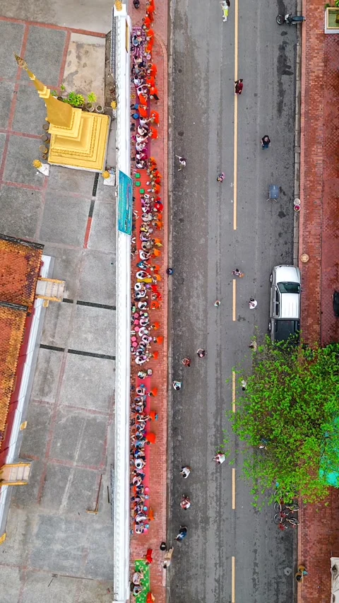 Monks strolling through the charming streets of beautiful Luang Prabang Stock Footage 242437186
