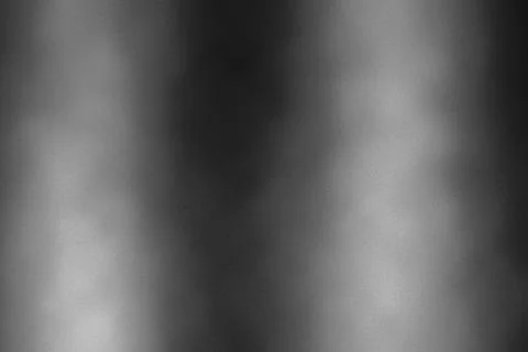 Monochromatic grainy background with vertical light rays for moody cinemati.. Stock Photos