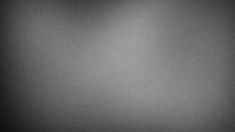 Monochromatic grey gradient background with a grainy texture, creating a ne.. Stock Photos