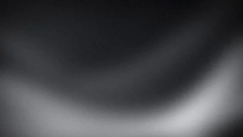 Monochrome black gray gradient 4k background abstract texture grainy wallpa.. Stock Photos