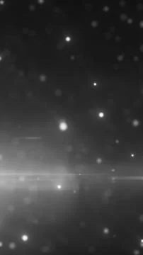 Monochrome floating particles and soft bokeh lights forming an atmospheric .. Stock Illustration