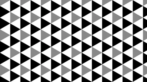 A monochrome geometric pattern of black, white, and grey triangles scrolling Video stock 319610705