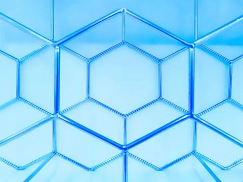 Monochrome geometric pattern of hexagons made of blue metal on a blue backgro Stock Photos