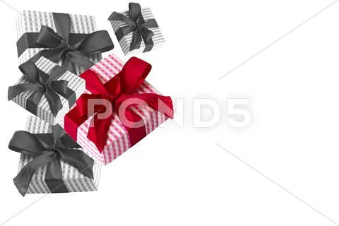 Monochrome gift corner with one red gift Stock Photos