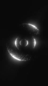Monochrome glowing particle sphere with orbiting rings on a black backgroun.. Stock Illustration