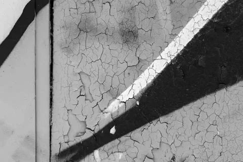 Monochrome graffiti elements painted on a weathered wall Foto stock