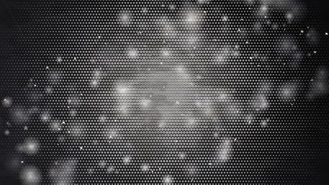 Monochrome halftone dot pattern with glowing bokeh lights and sparkling Stock Photos