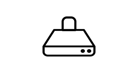 A monochrome image of a computer device with a prominent black handle. Stock Footage 334853152