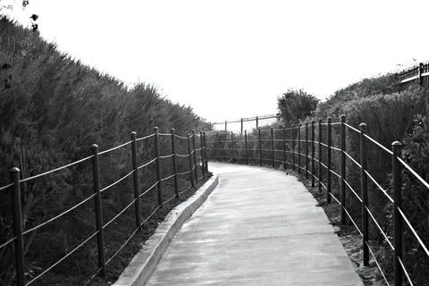 Monochrome pathway with railings Stock Photos