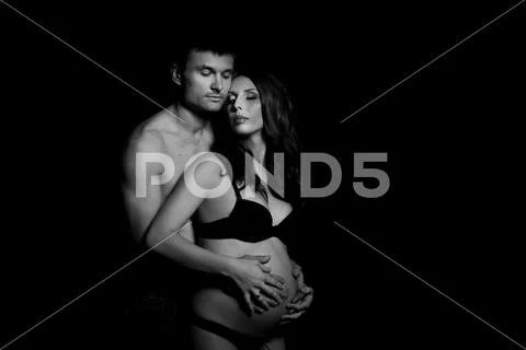 Monochrome portrait of happy loving couple in a moment of love and tenderness Stock Photos