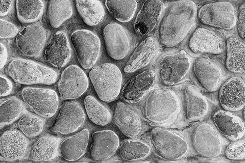 Monochrome stone wall texture. Stock Photos