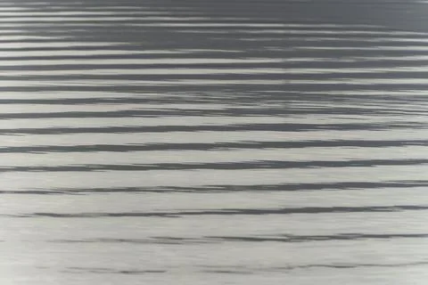 Monochrome surface ripples background Stock Photos