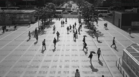Monochrome Time Lapse of crowd passing at station square in Summer. Stock Footage 65758265