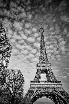 Monochrome View of the Eiffel Tower Under Dramatic Sky in Winter Stock Photos