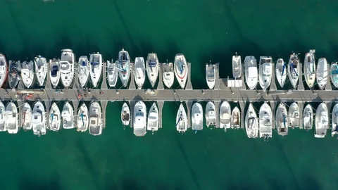 Monoco Top down aerial view of jetty with boats and people Stock Footage 119975882