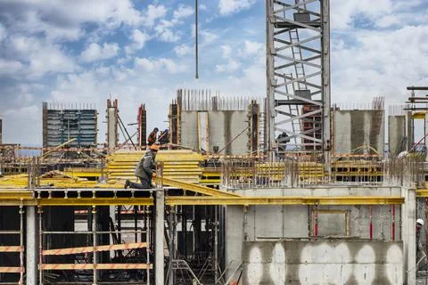 Monolithic frame construction of the building. Photos