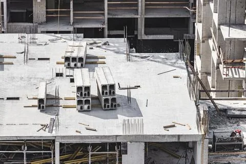 Monolithic frame construction of the building. Solid walls of concrete. Stock Photos