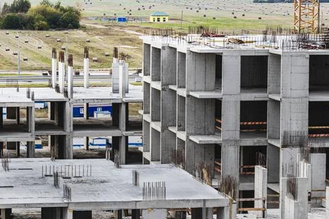 Monolithic frame construction of the building. Solid walls of concrete. Stock Photos