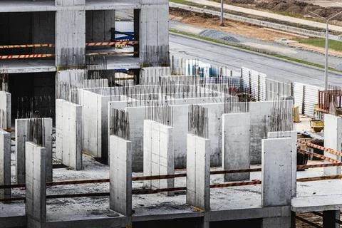 Monolithic frame construction of the building. Solid walls of concrete. Stock Photos
