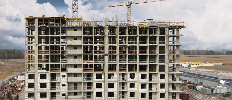 Monolithic frame construction of the building. Solid walls of concrete. Stock Photos
