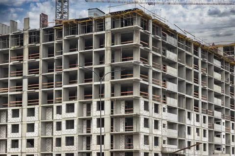 Monolithic frame construction of the building. Solid walls of concrete. Stock Photos