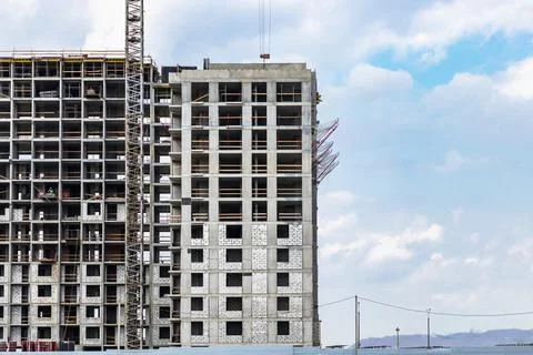 Monolithic frame construction of the building. Solid walls of concrete. Stock Photos