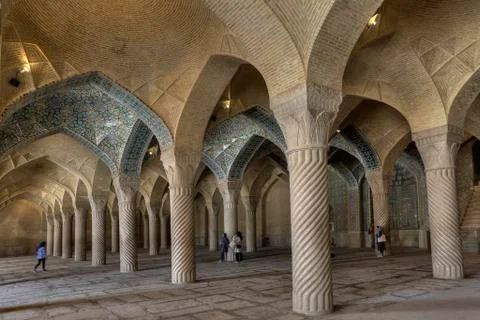 Monolithic pillars support arched vaults in Vakil Mosque, Shiraz, Iran. Stock Photos
