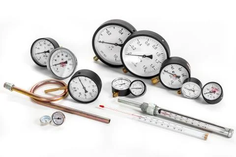 Monometers of different sizes on a white isolated background. Stock Photos