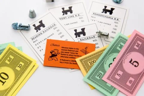 Monopoly board game in play Stock Photos