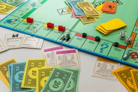 Monopoly board game in play Stock Photos