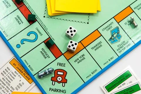 Monopoly board game in play Stock Photos