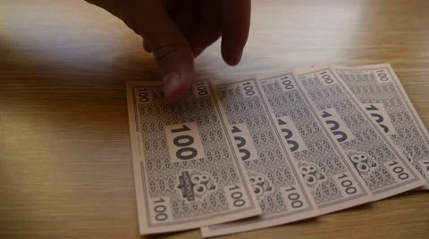 Monopoly Money Counting 100 Stock Footage 68973635