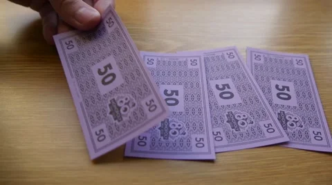 Monopoly Money Counting 50 Stock Footage 68973646