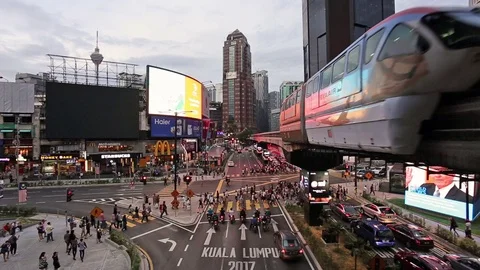Monorail and crowd in Bukit Bintang in Kuala Lumpur, Malaysia Stock Footage