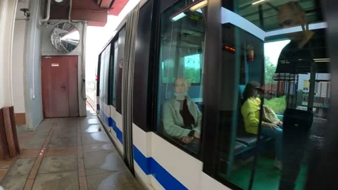 The monorail train departs from the station. Stock Footage 161006955