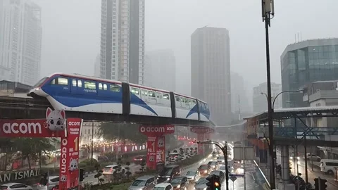Monorail train movement during heavy rain Stock Footage 300265089