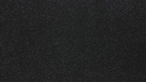 Monotonous black background in fine grain in motion from bottom to top Vidéo 232747792
