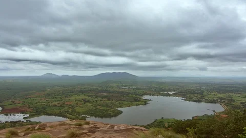 Monsoon clouds moving over the lake on the outskirts of Bangalore 스톡 동영상 87319212