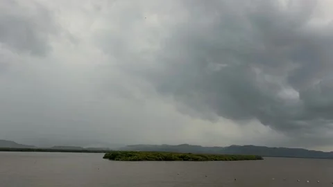 Monsoon Clouds over River and Hills Vidéo 337928926