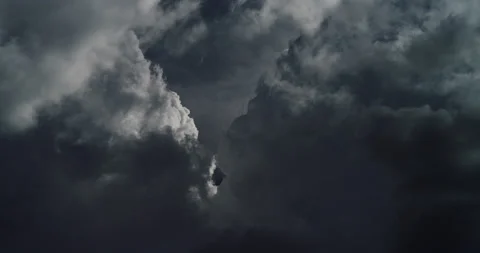 Monsoon fueled storm clouds roil and darken to become a dangerous thunderstorm. Stock Footage 201442596