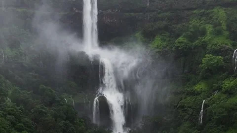 Monsoon huge Dramatic waterfall Drone shot 4K60 스톡 동영상 332893159